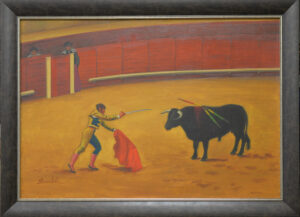 Matador in a yellow suit faces a charging black bull inside a bullring with red barriers and a yellow arena floor.